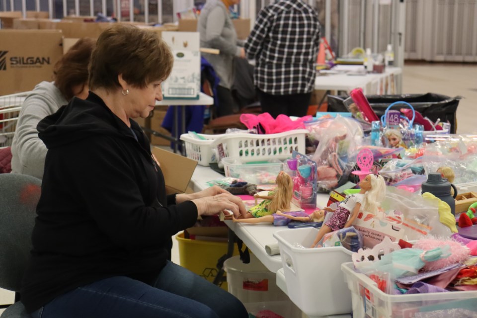 Volunteers at the Christmas Cheer Depot are sorting, handcrafting, and packaging a wide assortment of toys, gifts, and other essentials for an increasing demand of children and adolescents in need of some holiday spirit.  