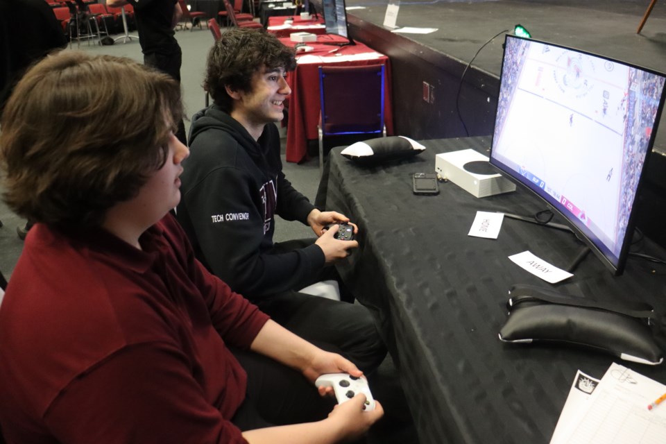 St. Mary's College students Jacob Pelletier and Logan Lafontaine provided mentoring for younger kids during the school's "Beyond the Game" Esports tournament on Nov. 29, 2023.