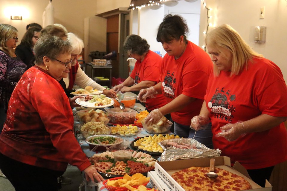 Volunteers with "Making a Difference" hosted a potluck for adults with special needs, as well as seniors, at the Moose Lodge on Dec. 11, 2023.