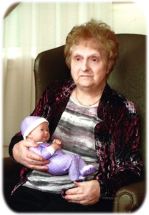 Giustini, Cecilia with doll