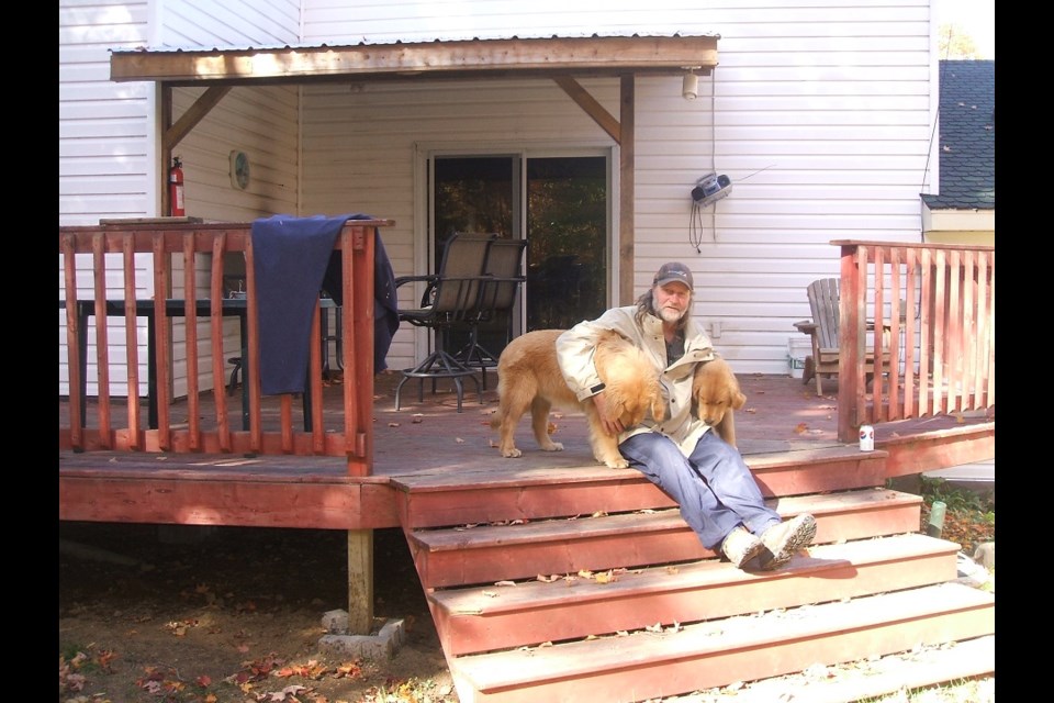 Author Glen Cressman with his dogs Karl and Caesar. 