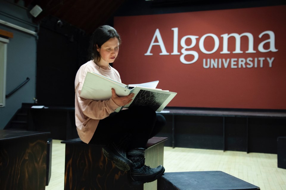 Tova Arbus works on her lines before rehearsal in the Shingwauk Auditorium. Photo provided courtesy of Tova Arbus.