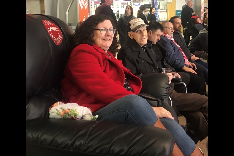 Ninety-four-year-old World War II veteran Robert Bonell enjoys a Soo Greyhounds game from the Best Seats in the House. 