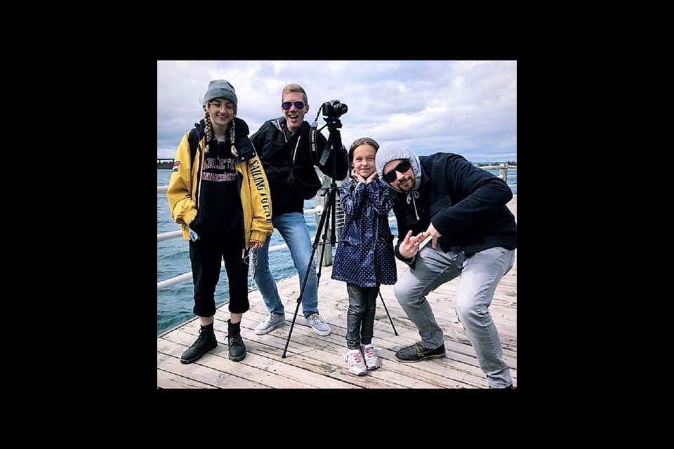 Hannah Rausch, Brendan Garlick, Jett Jones and Aaron Allessandrini on the set of The Conspirators' video shoot. Photo provided. 