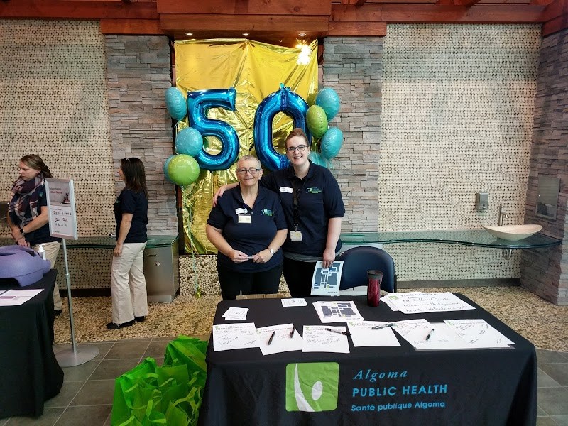 Debbie Corbett and Kaytee Iachetta part of the welcoming committee for Algoma Public Health's 50th Anniversary celebrations