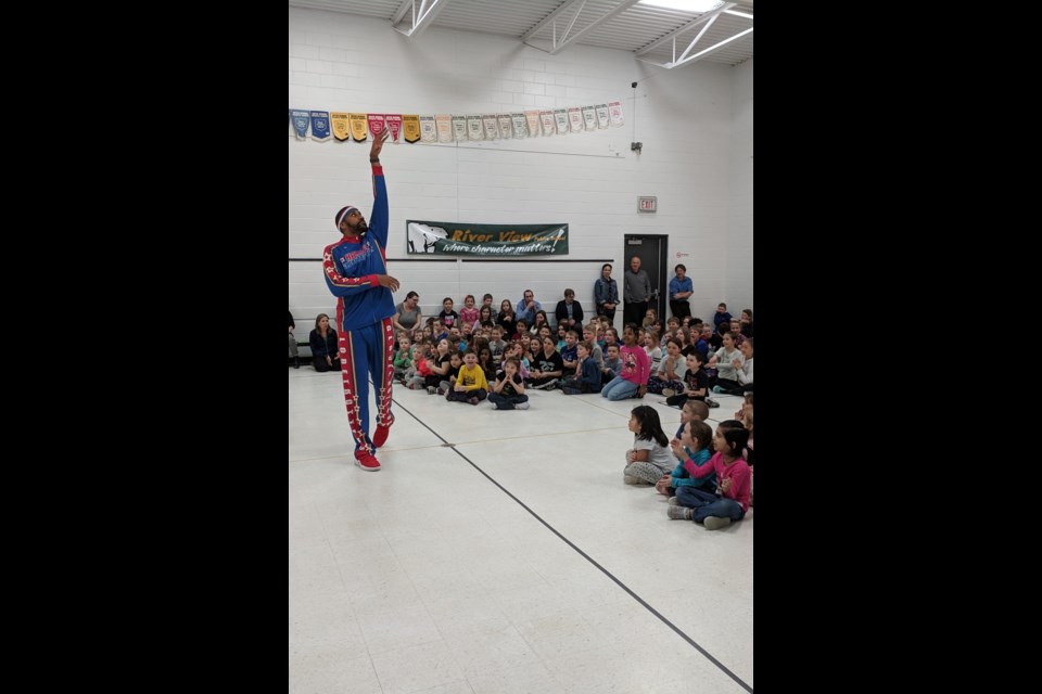 This Thursday River View Public School was visited by a very special tall guest from the Harlem Globetrotters to talk to the students about bullying and communication