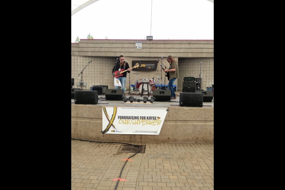 Johnny and The Revelators perform at the Concert for Kayge fundraiser Saturday at the Robert Bondar Pavillion