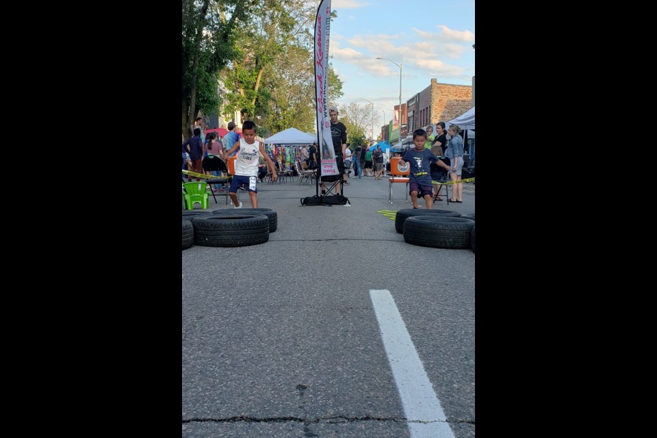 Koach Katrina and Rainbow Klub host the 1st Downtown Street Party Obstacle Kourse Thursday on Queen St. in front of The Klub. Photo by Koach Katrina /Bulletin