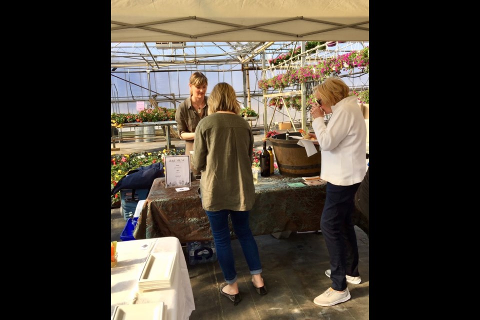 Guests were surrounded by flowers and friendship at the Chamber of Commerce Take 5 event hosted by New North Greenhouses