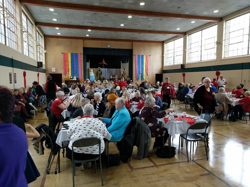 St. Andrew's United Church hosts their Annual Tea and Bazaar with full tables and a waiting line for the delicious tea and treats