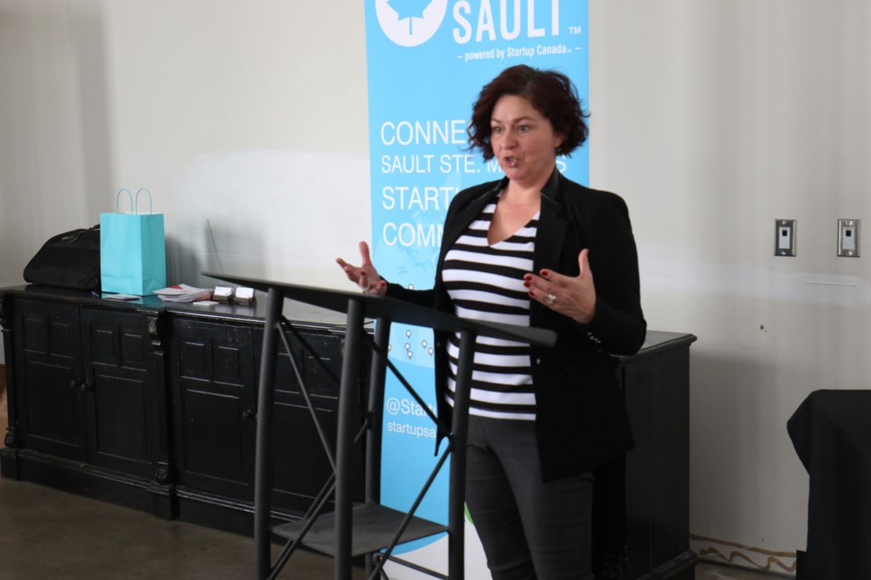 Tammy Ovey, life coach at Success U Life by Design, speaks to people attending the Women's Success Luncheon in celebration of International Women's Day at The Machine Shop Wednesday. James Hopkin/SooToday