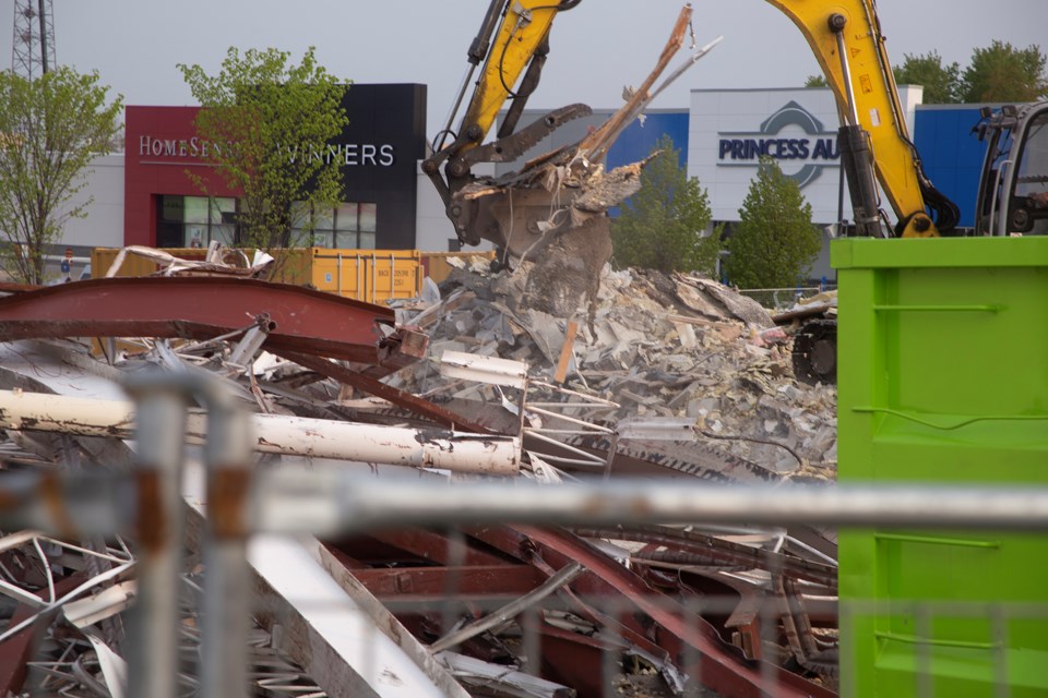 Demolition crews seen Tuesday morning at the former Pennington's retail store on Northern Avenue East at Gt. Northern Road. Prior to its time as a women's clothing store, the building served as the Sault Ste. Marie location for the Red Lobster restaurant chain.