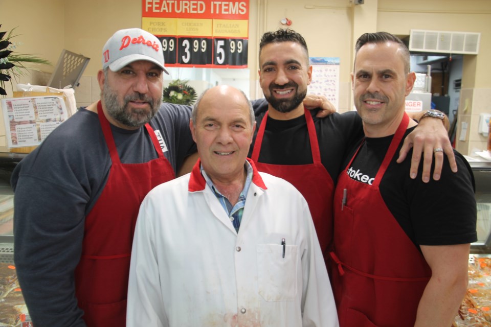 Retiring City Meat Market owner John Bruni, centre, with new co-owners Ernesto DiBerardino, Anthony Celli and Sonny Spina, Dec. 4, 2023.