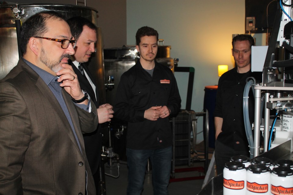 Glenn Thibeault, Minister of Energy, Christian Provenzano, Sault mayor, along with OutSpoken Brewing co-owners Graham Atkinson and Vaughn Alexander at a funding announcement for the Sault microbrewery, Apr. 21, 2017.  Darren Taylor/SooToday 