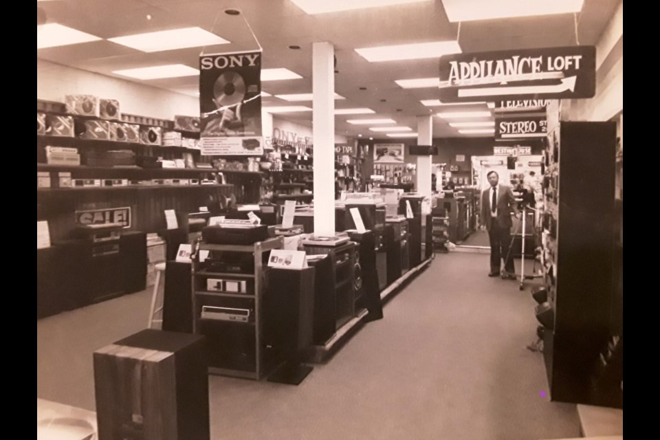 Moore’s Audio Video, circa 1980s, with then owner/operator Paul Moore at rear. Photo supplied