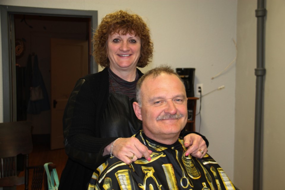 Sault barber Laura Harten with husband Roy in her recently-opened Harten’s Barbershop on Queen Street, May 16, 2019. Darren Taylor/SooToday