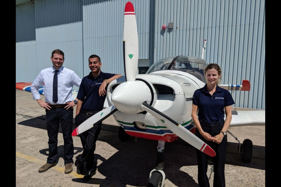 Jim Cairns, Sault College aviation technology-flight program instructor, with students Moiz Khatra and Marla Keyes, June 21, 2019. Darren Taylor/SooToday