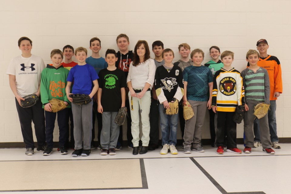 Teacher and coach Teena Coventry, middle, poses with some of her students at Greenwood Public School in 2018. James Hopkin/SooToday