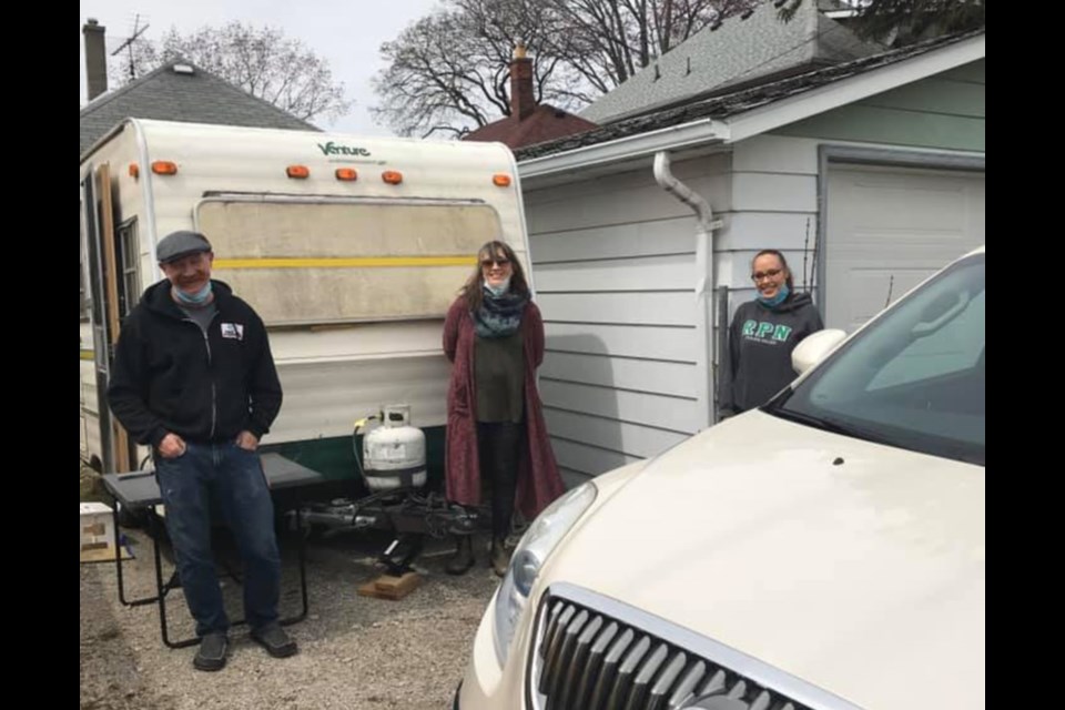 Healthcare worker Natalie Gordon, right, has been loaned a trailer by Charlie and Karen Morand in Windsor, Ont. through the RVs for Canada's Frontline social media group. Photo supplied