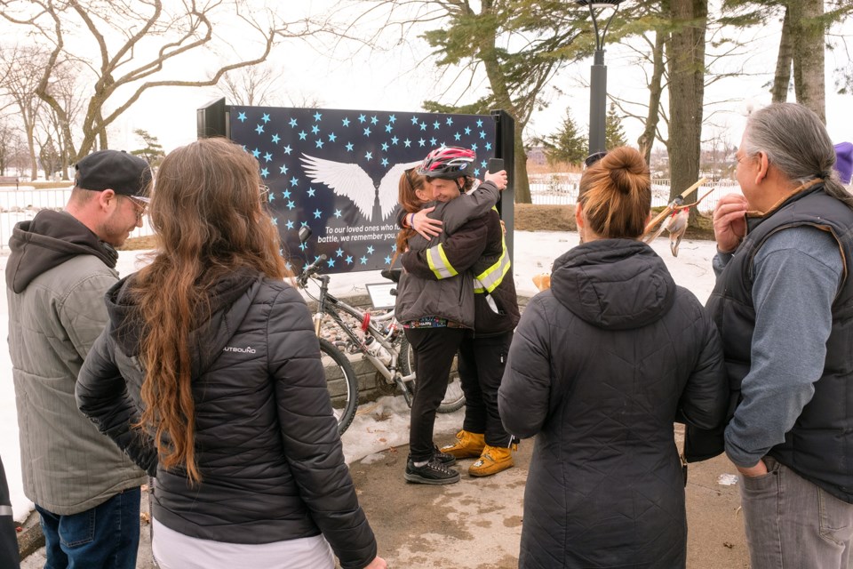 Guillaume McMartin is seen off by well-wishers on Monday morning prior to his long journey to Winnipeg by bicycle. McMartin hopes to eventually make it to The Yukon before continuing south to Argentina.