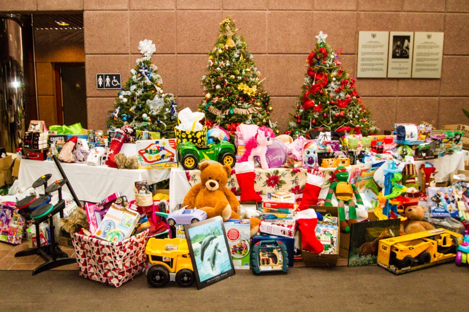 Ontario Public Service employees gathered at Bondar Place to make their annual donation to Christmas Cheer on Friday, Dec. 2, 2016. Donna Hopper/SooToday
