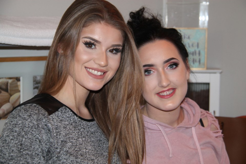 Iesha Godbout, makeup artist (at left), who will be offering free makeovers to young local women wanting to look and feel their best for high school proms this June, with client Sara Eastman after Sara received a free makeover from Iesha, Feb. 12, 2018. Darren Taylor/SooToday