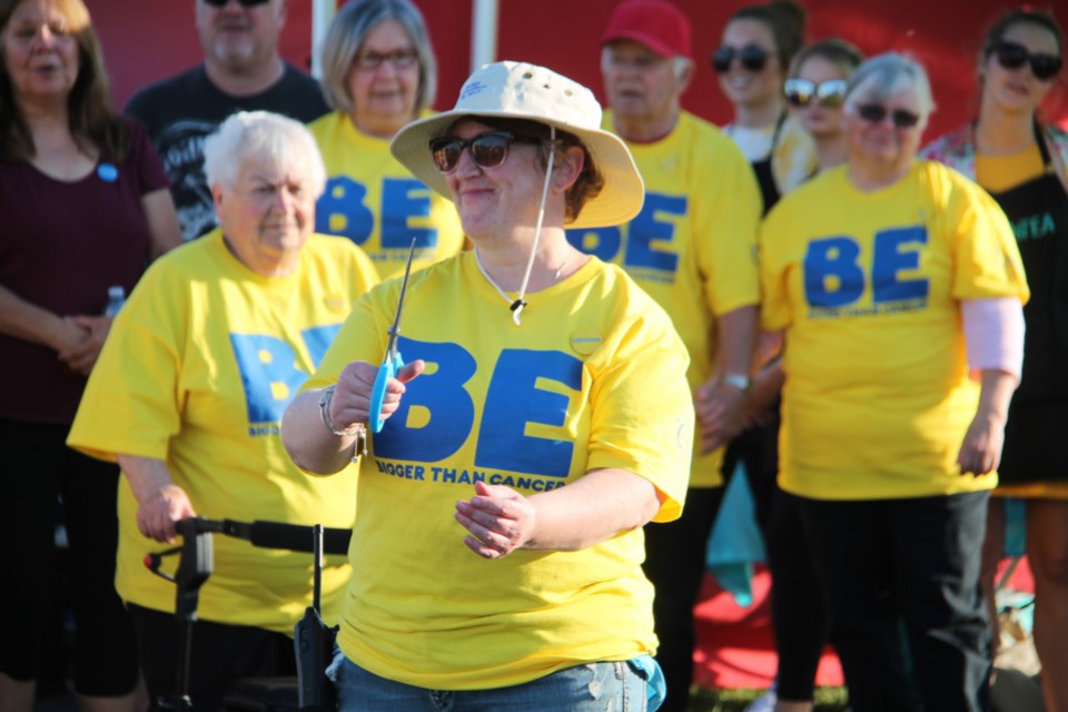 Cancer survivor Kinneret Margovski after cutting the ribbon before the start of the survivors lap at the annual Canadian Cancer Society Relay for Life held at Korah Collegiate, June 7, 2019. Darren Taylor/SooToday
