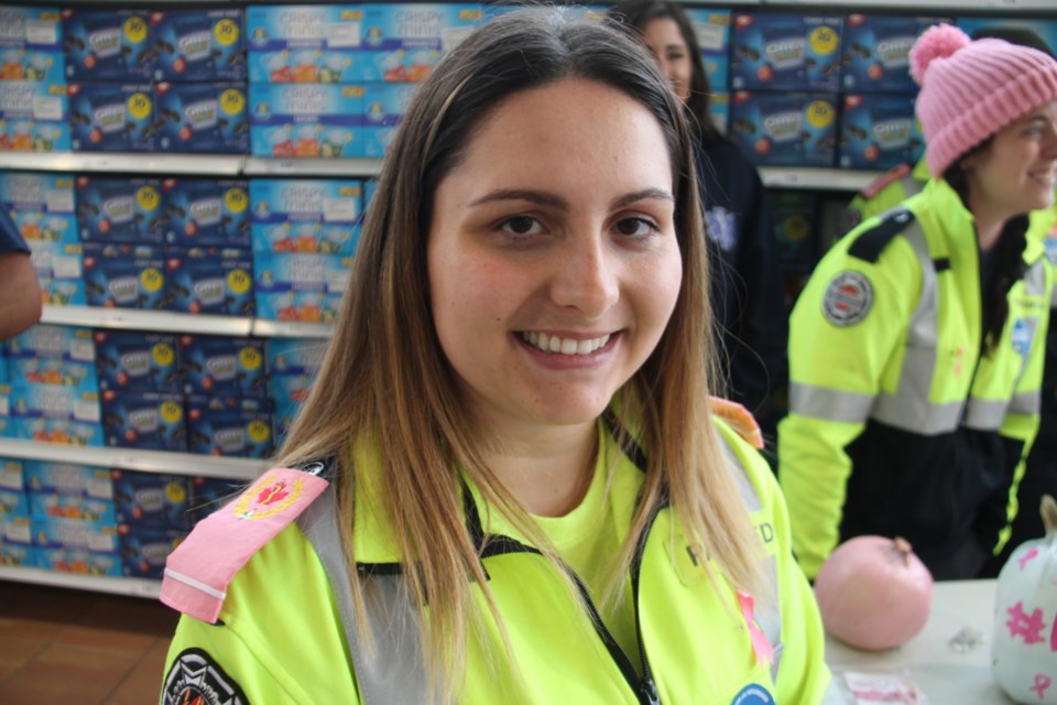 Nicole Levesque, Sault EMS paramedic with pink epaulettes, at Rome’s Your Independent Grocer, one of several local paramedics involved in a breast cancer research fundraiser, Oct. 12, 2019. Darren Taylor/SooToday