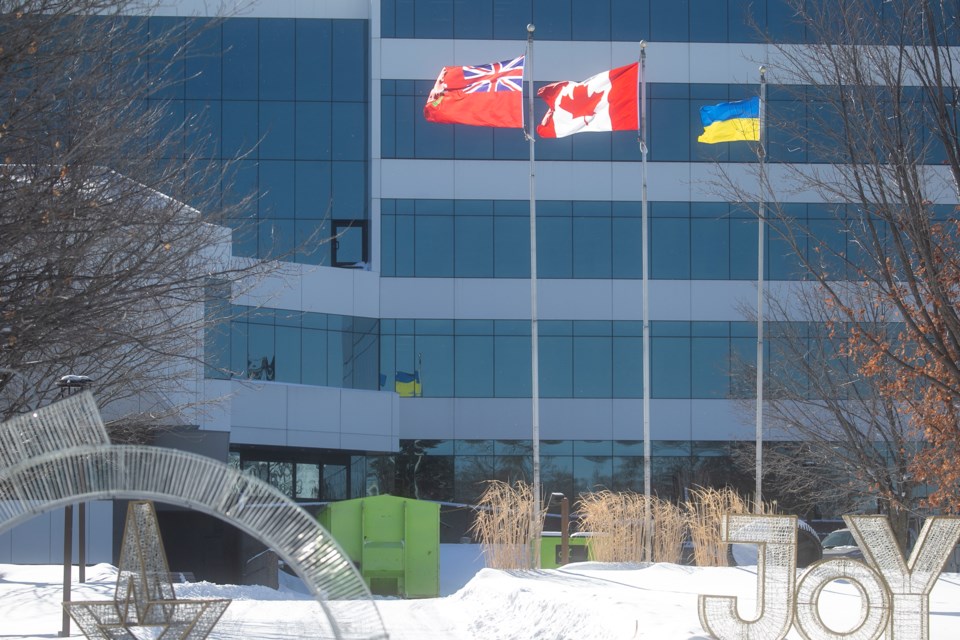 The Ukrainian flag flies alongside the Canadian and Ontario flags at the Ronald A. Irwin Civic Centre. Friday marks the one-year anniversary of the invasion of Ukraine by Russia.
