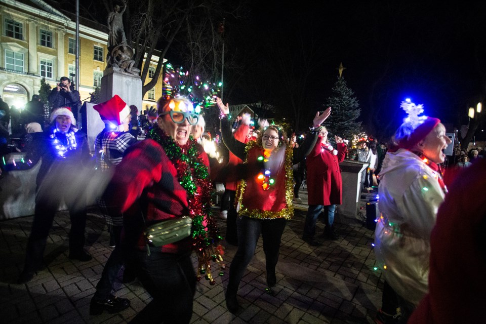 Dancers from Soo Sings for Kids perform a flashmob performance prior to the tree lighting during Moonlight Magic on Thursday