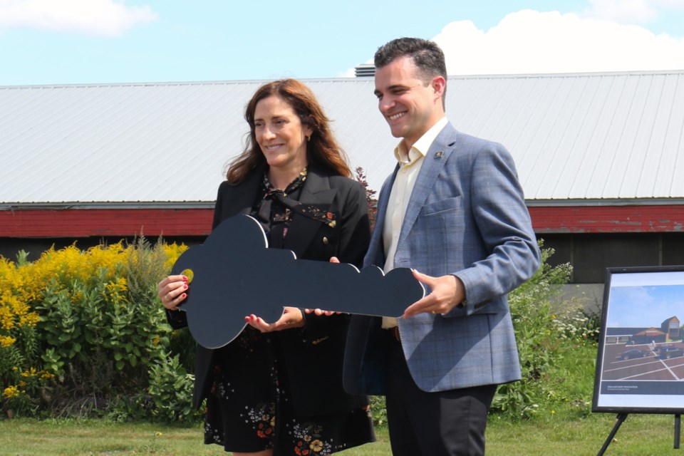 Sault Ste. Marie Mayor Matthew Shoemaker, right, joined Canal District spokesperson Melissa Porco to announce the redevelopment of the former fish hatchery site downtown. 