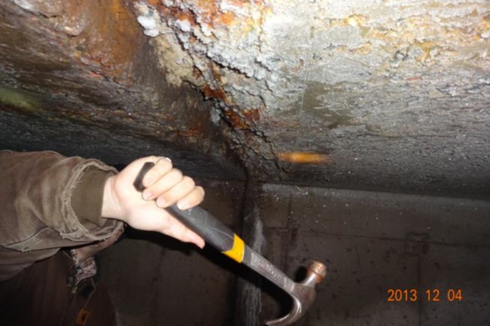 2013 engineering inspection of Fort Creek aqueduct, a century-old subterranean passage that channels Fort Creek beneath the streets of Steelton. Tulloch Engineering photo