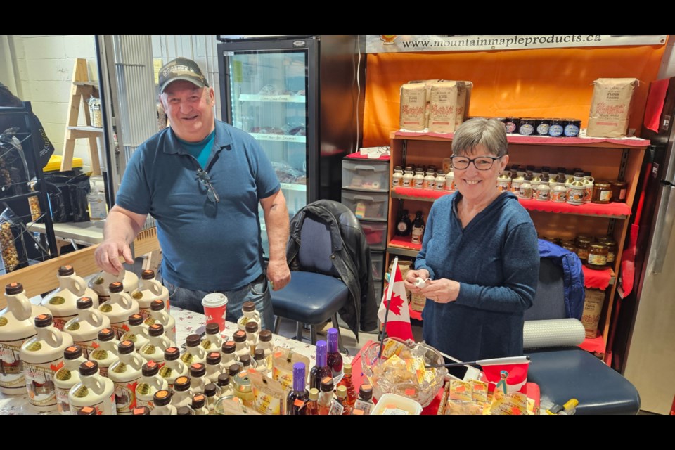 Mountain Maple Products owners Don and Suzanne Manchur at Soo Market, April 19, 2025.