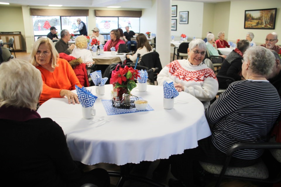 Ontario Finnish Resthome residents, staff and volunteers at a party held at the home, Dec. 4, 2019.