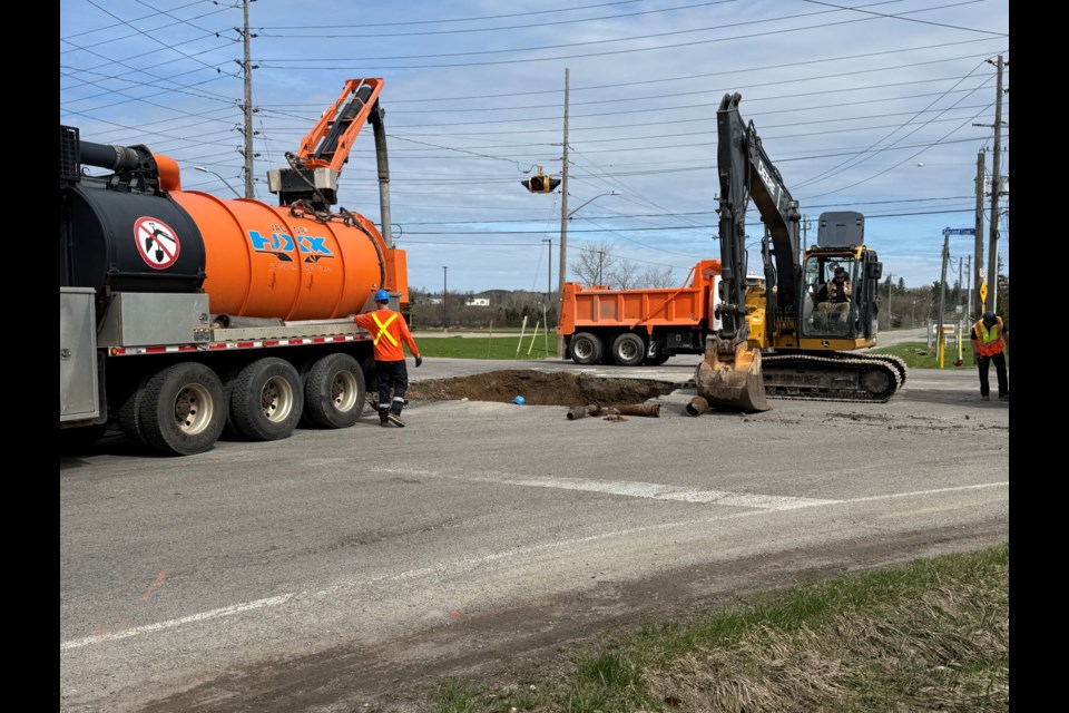 PUC employees working at the Second Line West and Allen's Side Road intersection.