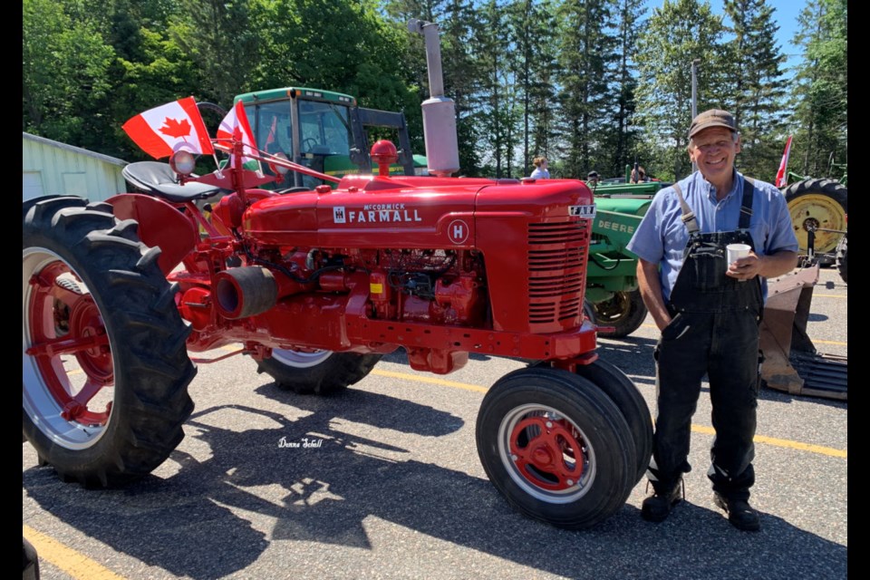 Greg Gilbertson with his 1946 Farmall H tractor.