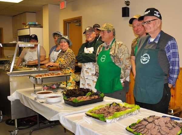 Volunteers with the St. Joseph Island Hunters and Anglers Association prepare to serve more than 200 guests that attended the 22nd Annual Wild Game Dinner held  at the Royal Canadian Legion in Richards Landing. Donna Schell for SooToday