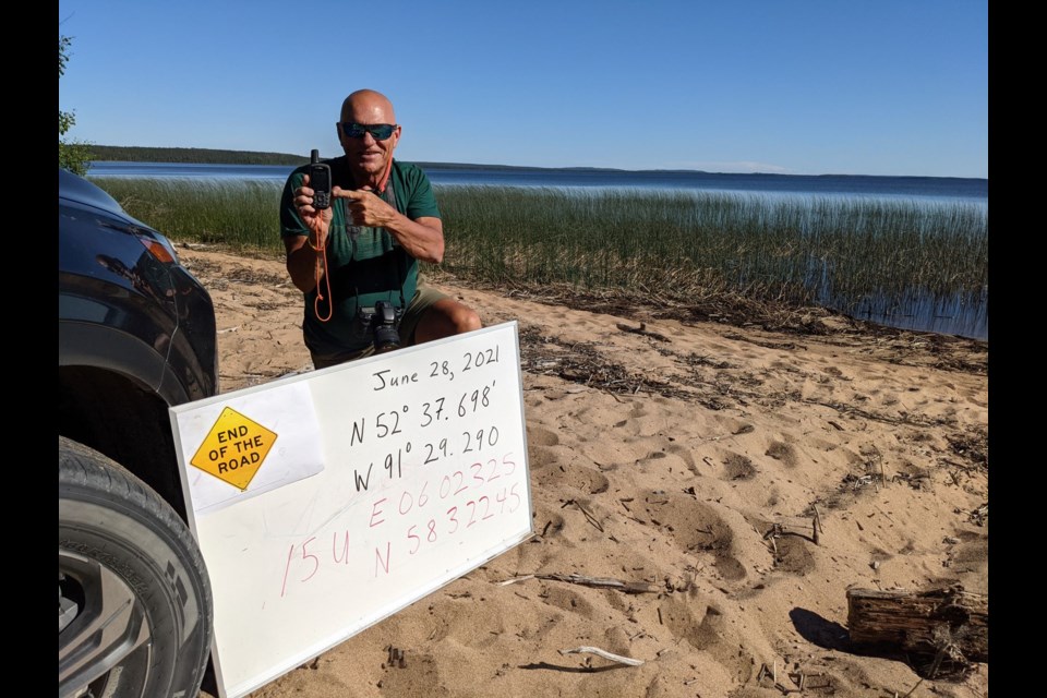 The souvenir commemorative sign with Back Roads Bill, as far as you can drive or you will be in Windigo Lake.