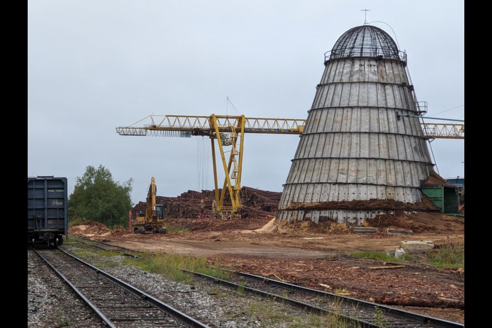  Wood burners are becoming relics on the landscape this one is near the operating mill at the railway tracks crossing. 