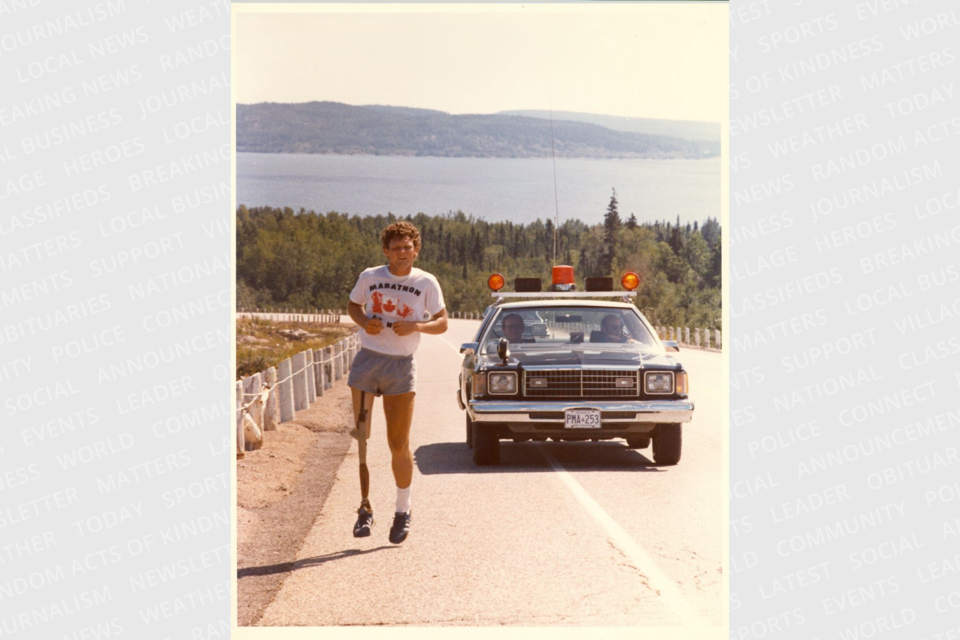 Terry climbing the very long Cavers hill on Lake Superior near Rossport.  