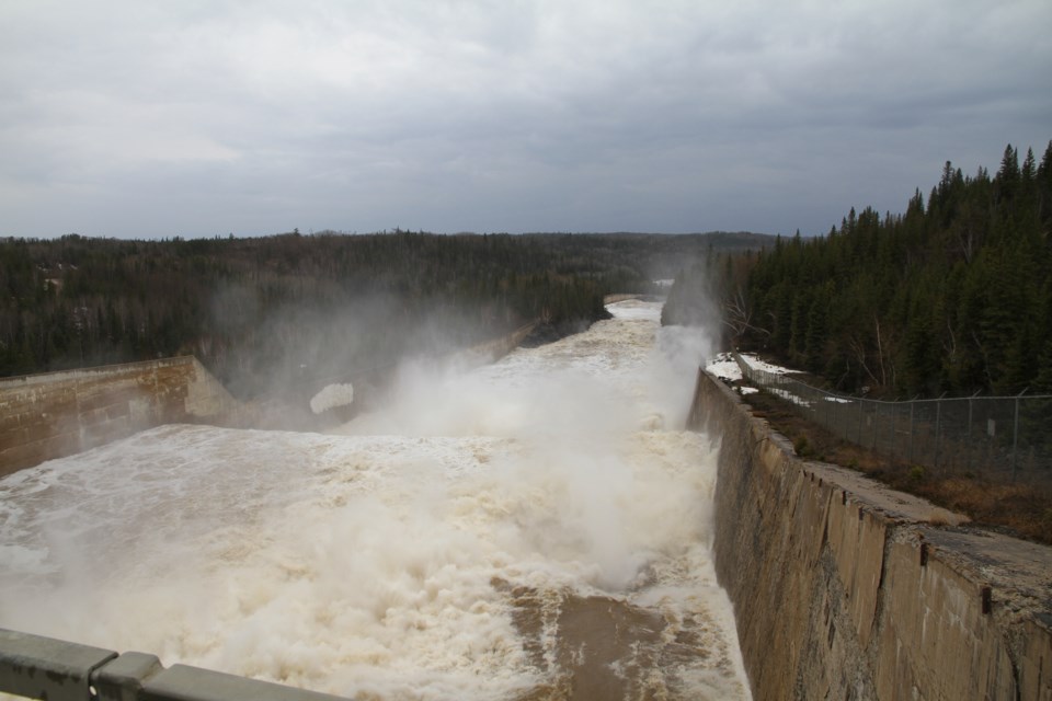 This is a spring view of the torrent of water in the adjacent spillway at Abitibi Canyon.