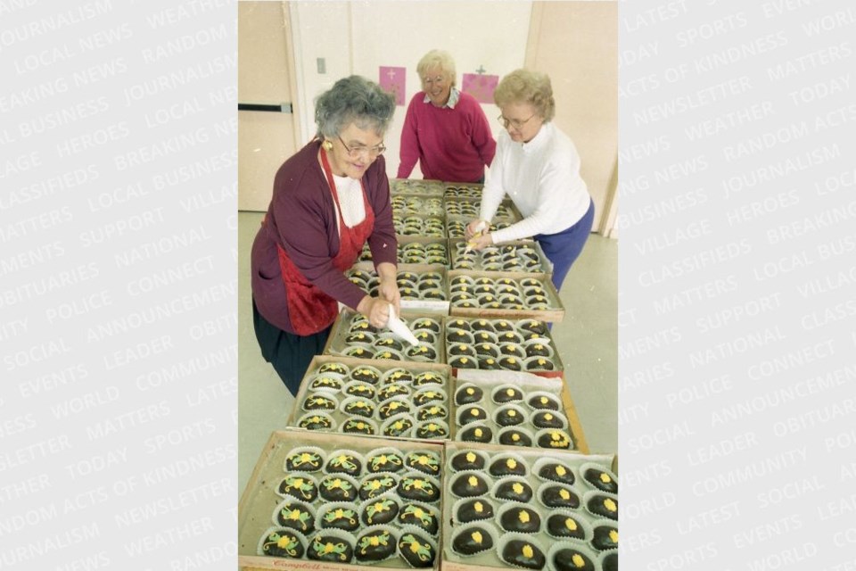 April 6, 1995: Mary Ann McComskey, Norma Hankinson and Catherine Campbell put the finishing touches on hand-dipped Chocolate Easter eggs in April 1995.  The chocolate eggs were made for the St. Matthew’s Anglican Church Women to be sold as a fundraiser. 