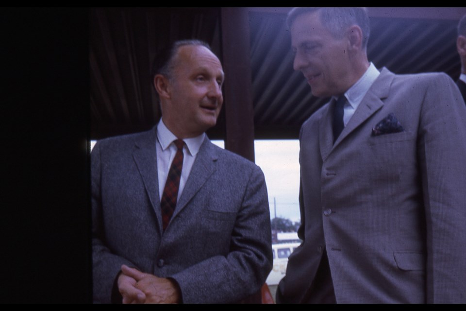 Tom Angus, left, is pictured in this Sault Ste. Marie Public Library archive photo