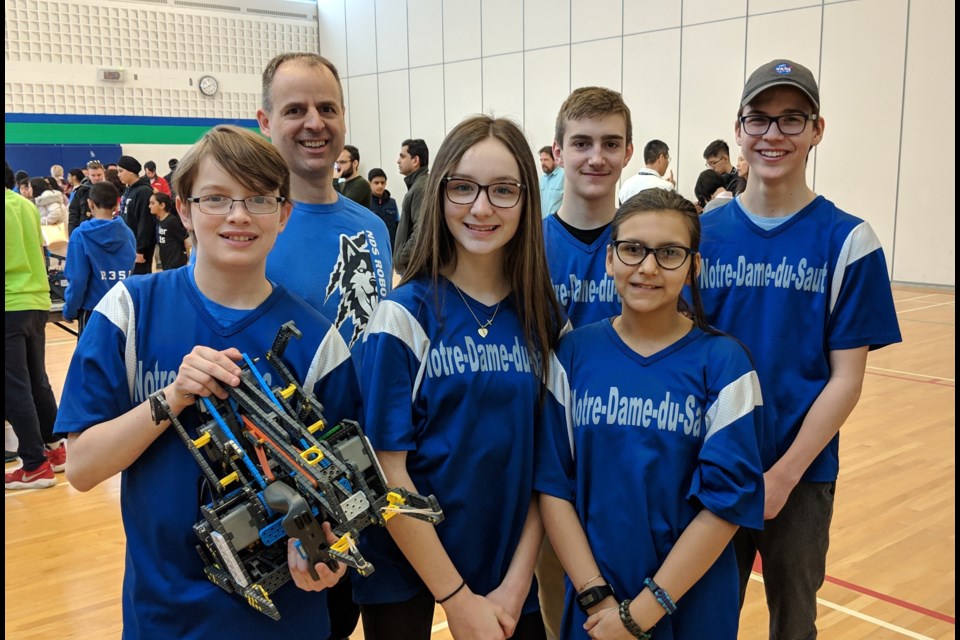 The Notre-Dame-du-Sault Alpha robotics team includes, from left, Liam Spacek, David Spacek (coach), Ella Dubreil, Luke Dallaire, Gabriela Gutierrez and Cole Clement. Supplied photo