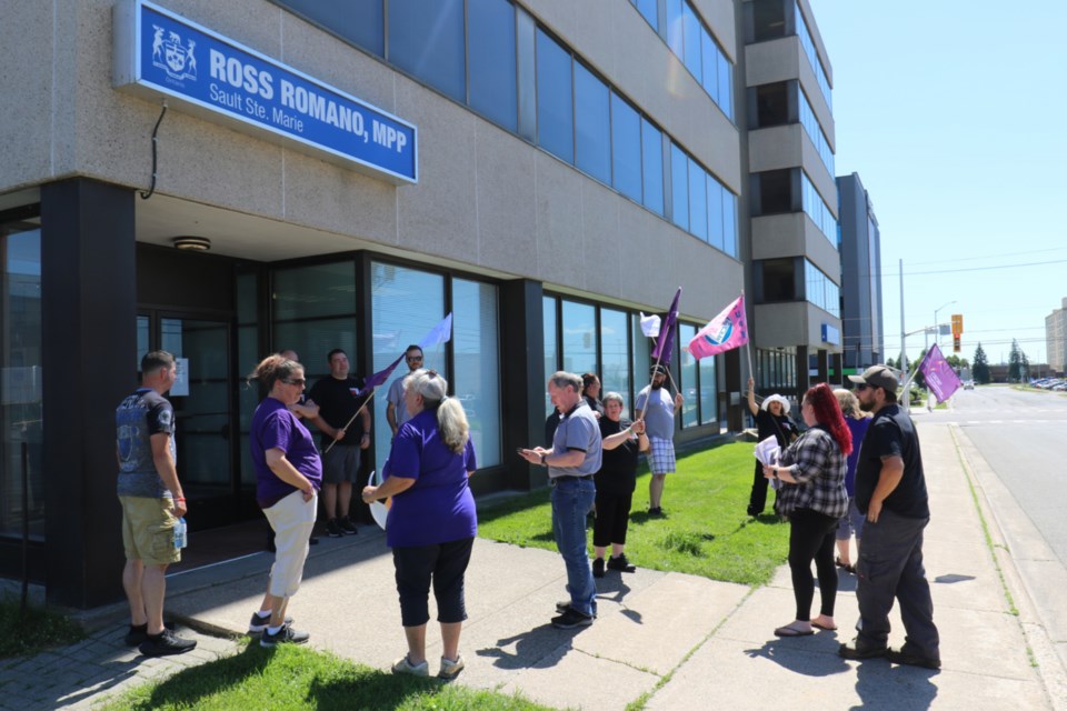 Local school board employees represented by CUPE Local 16 and CUPE Local 4148 delivered hundreds of letters to Sault MPP Ross Romano's office Thursday, demanding wage increases and improved working conditions. 