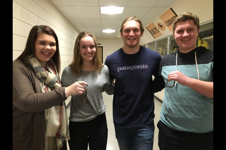 Korah Collegiate students Halle Zachary, Alycia Matthews, Elliot Caruso and Owen Appleton are taking part in Korah’s Kindness Bracelet program, Dec. 13, 2017. Darren Taylor/SooToday
