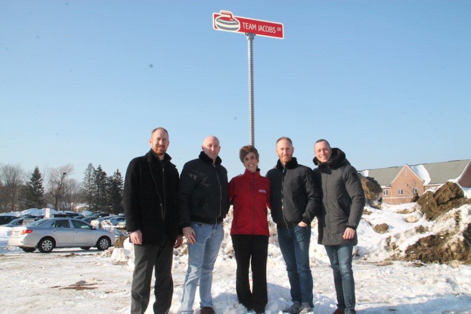 Pat Murray, Algoma University Alumni Council chair, Ryan Harnden, Asima Vezina, Algoma University president and vice-chancellor, Brad Jacobs and E.J. Harnden at the dedication of Team Jacobs Drive at the George Leach Centre, Feb. 14, 2018. Darren Taylor/SooToday