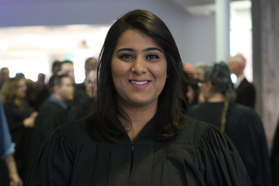 Jasmine Thind and her sister, Aashmeen Thind, both officially graduated from the police foundations program during Thursday's convocation ceremoney at Sault College. James Hopkin/SooToday
