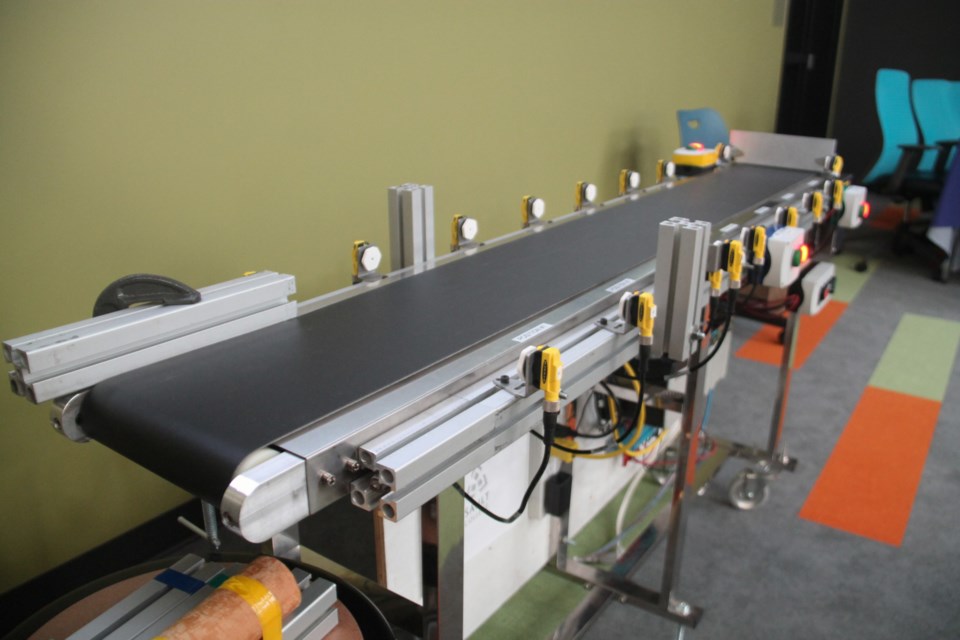 A scale model of the Boniferro automated conveyor project — designed by Sault College students — at a demonstration of the new technology at the college, April 27, 2023.