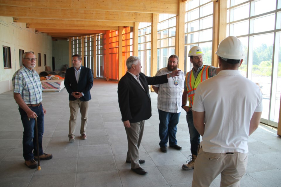 Marco Mendicino, Parliamentary Assistant to the federal Minister of Infrastructure (second from left) and Sault MP Terry Sheehan on a tour of the soon to be completed Anishinaabe Discovery Centre, July 3, 2019. Darren Taylor/SooToday 